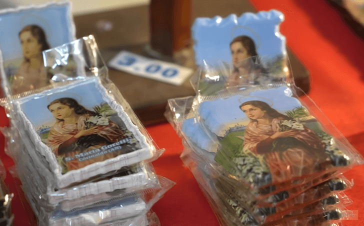 Maria Goretti devotional holy cards for sale at a market stall, three euros